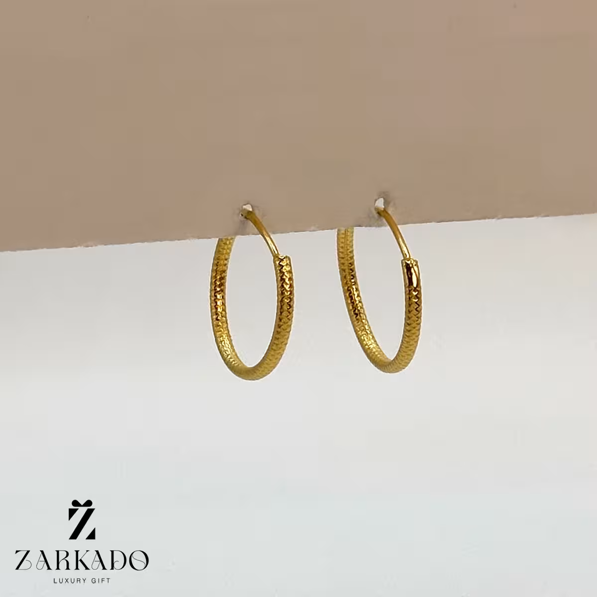 گوشواره حلقه ای طلا مدل پوست ماری کد E18368