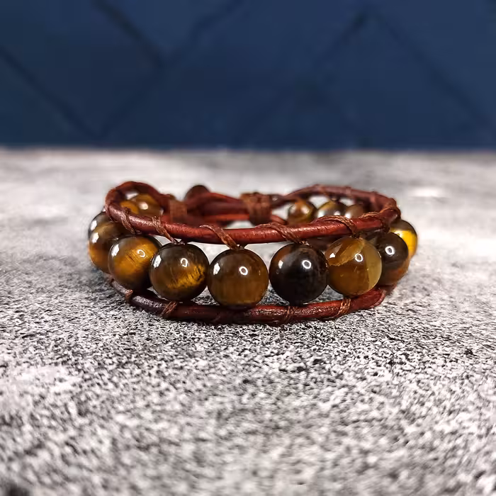 دستبند مدل سنگ چشم ببر دکمه ای 70