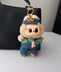 لبوبو سوپرایزی وارداتی با لباس عروسکی و عینک خلبانی