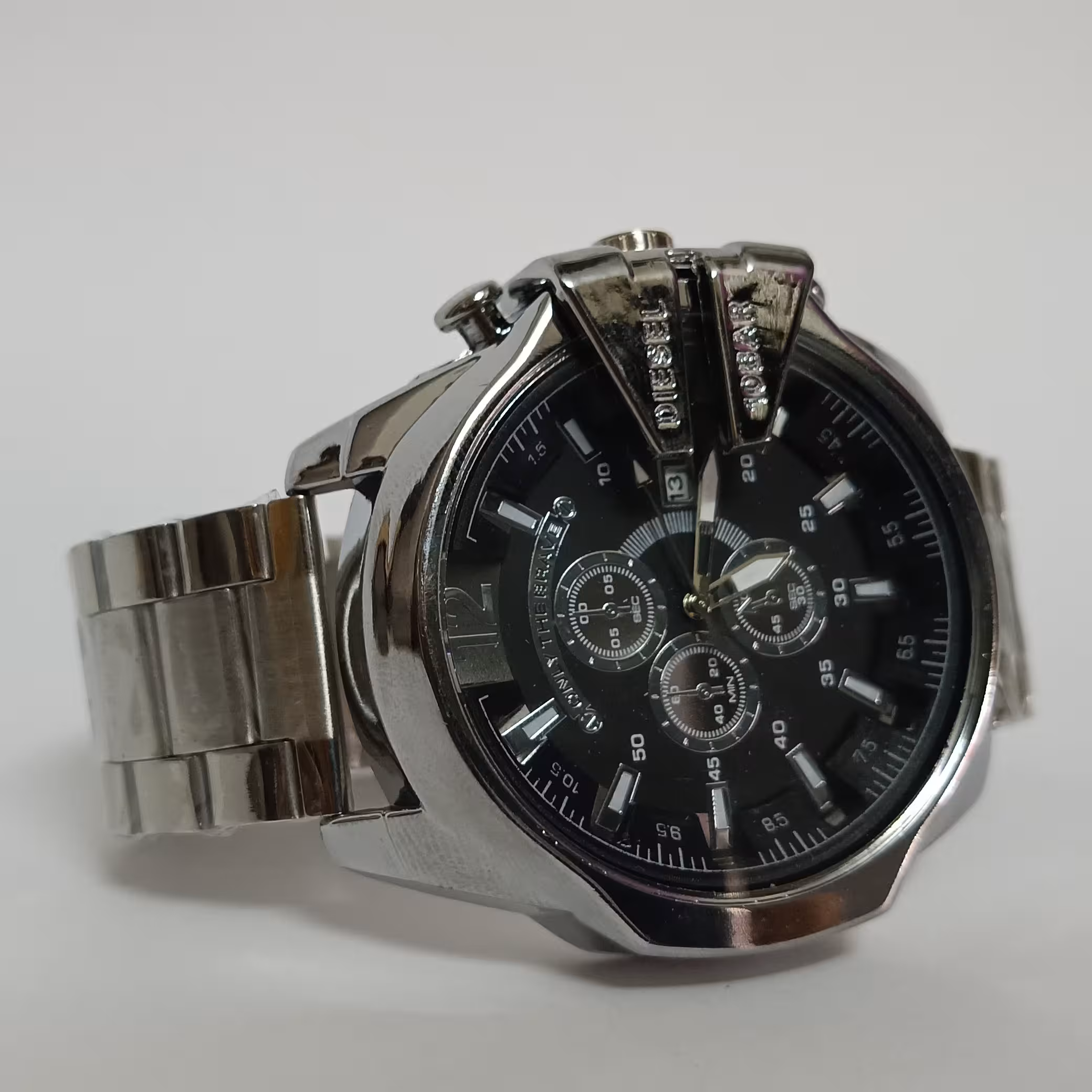 ساعت مچی دیزل طرح شاخدار تقویم دار و ضمانت  کیفیت کالا