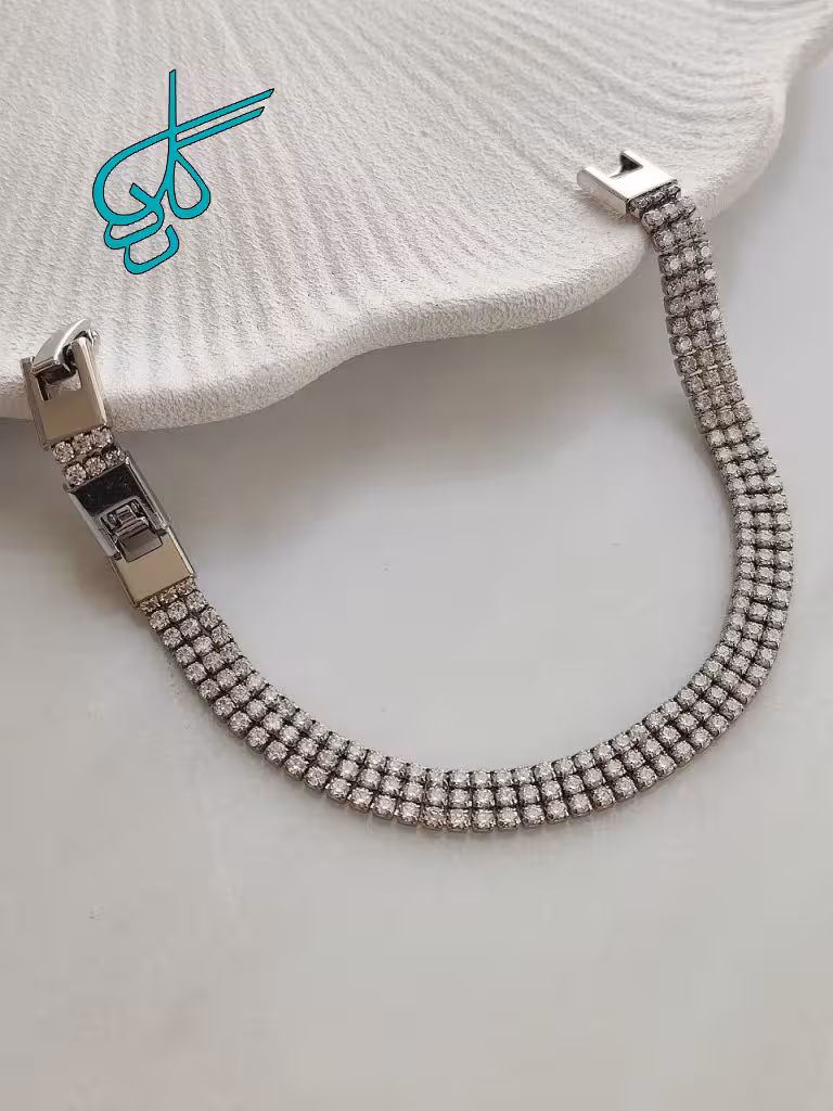 خرید دستبند مارک ژوپینگ نگیندار سه ردیفه طول 19 میلیمتر پهنای 6 میلیمتر کیفیت عالی رنگ ثابت کد 1216906 - ردگل