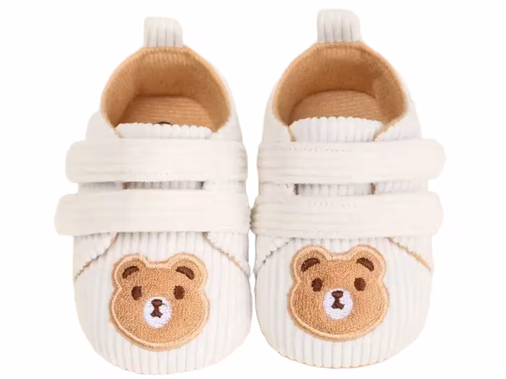 پاپوش استپ دار نوزادی مخمل کبریتی طرح تدی رنگ کرم روشن