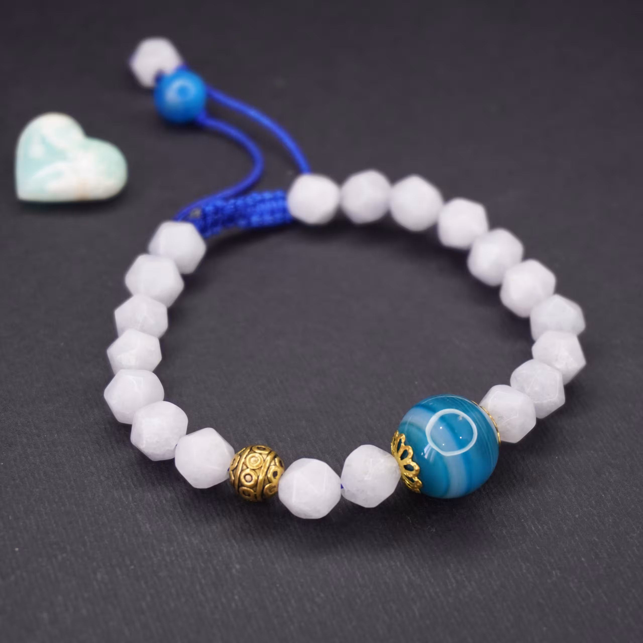 دستبند سنگ اکومارین وعقیق وگوی برنج کد 310187