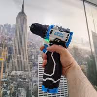 دریل شارژی 18 ولت دوباتری موتور براشلس طرح هیوندا  ادون پرومکس پیچگوشتی شارژی سه نظام فلزی همراه کیف و لوازم