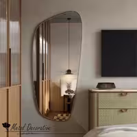آینه دیواری دفرمه با فریم فلزی