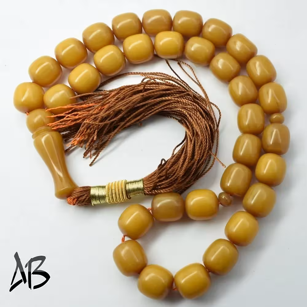 تسبیح سندلوس 33 دانه کد 1036 بودار تراش استوانه‌ای لبه گرد خوشرنگ آقابزرگ