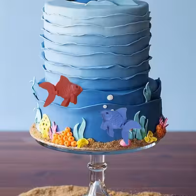 ابزار تزیین کیک به گز مدل ماهی دم متحرک مجموعه 50 عددی