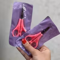 قیچی ابرو چند کاره دسته صورتی بانوی خاص