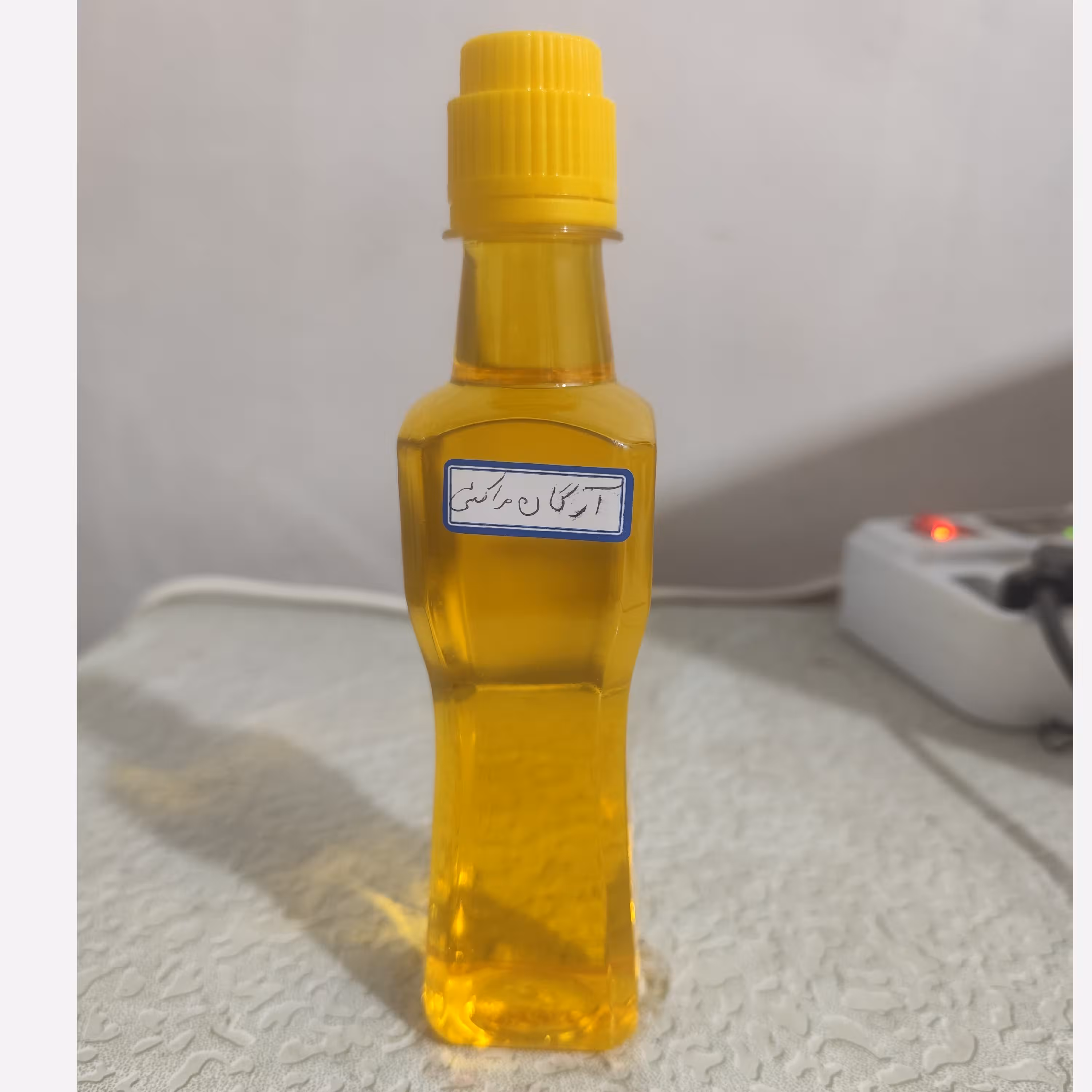 روغن آرگان مراکشی معطر اصل ربع لیتری 250 سی سی (بهبود چین و چروک ضدریزش مو رشد مو جوش صورت)
