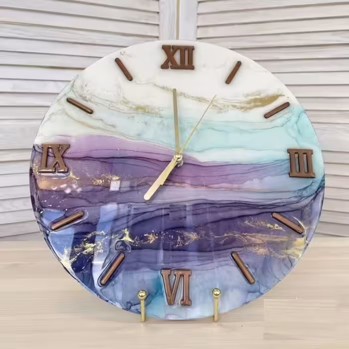 ساعت دیواری رزینی طرح ابر و بادی قطر60