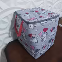 باکس اسباب بازی و لباس بچه. در رنگهای متنوع و زیبا باطرحهای عروسکی جذاب