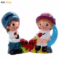 مجسمه دختر و پسر کلاه دارکدDKO-31