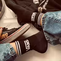 جوراب ساقدار اسپرت طرح Vans کش انگلیسی مشکی فری سایز