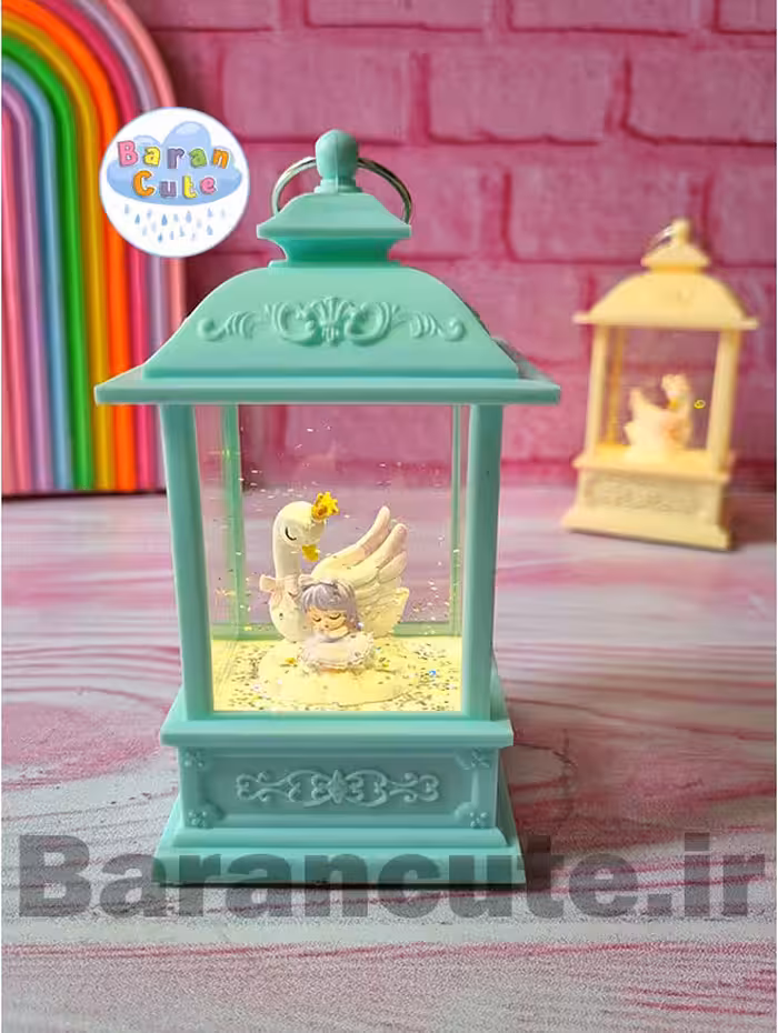 فانوس موزیکال چراغ دار طرح دختر و قو سبز پاستیلی