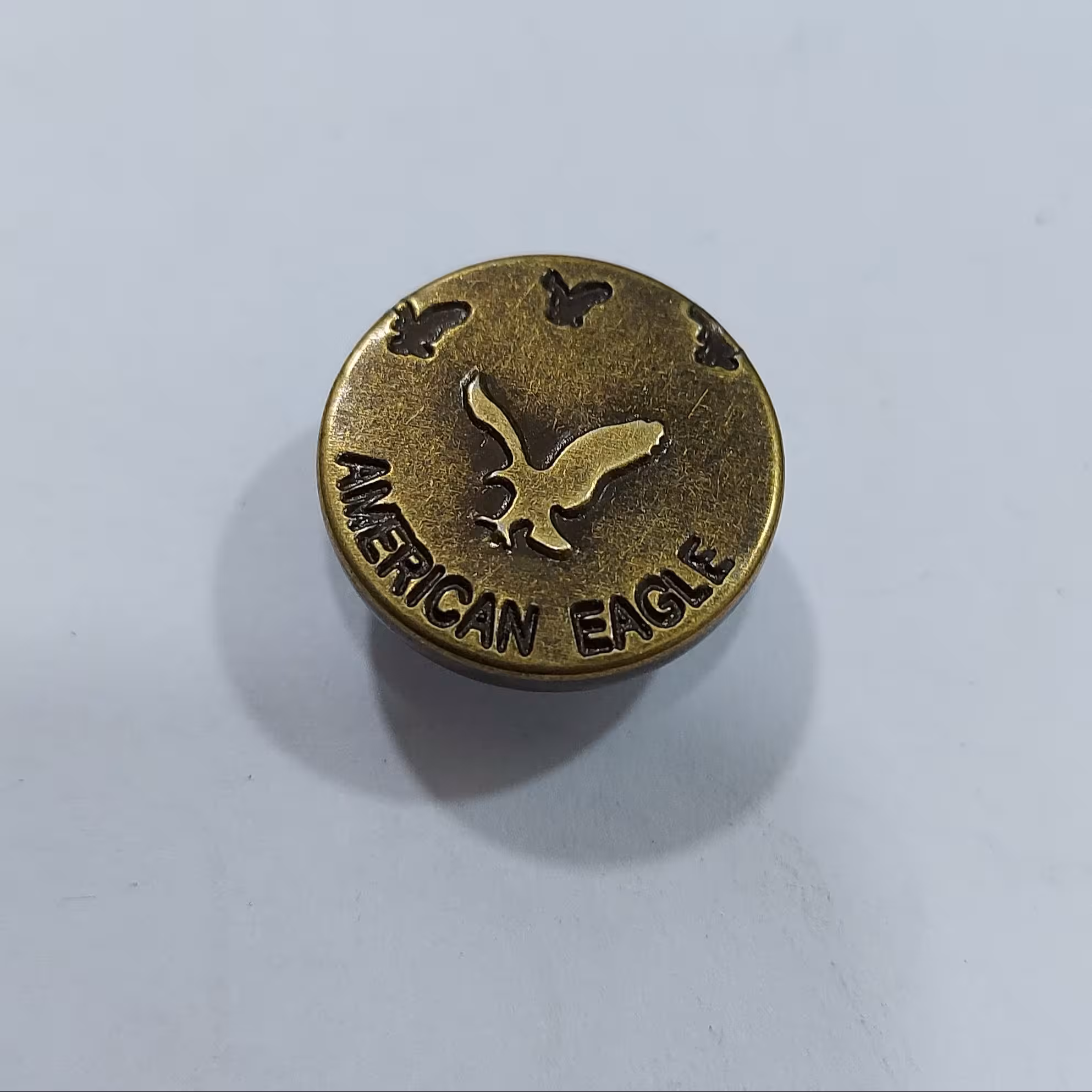 دکمه طرح عقاب جنس آهن رنگ زردقلم مناسب شلوار و کت جین