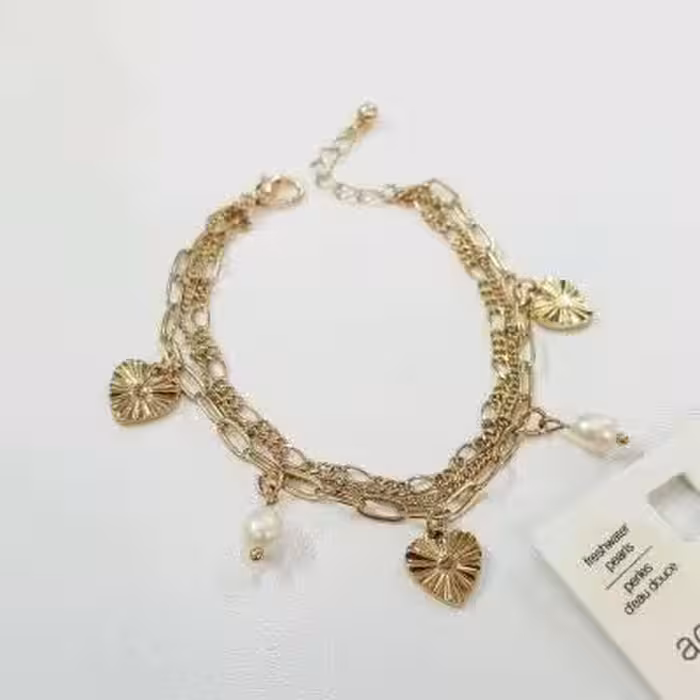 دستبند سه ردیف طلایی آویزدار ، کار شده با مروارید آب شیرین اصل