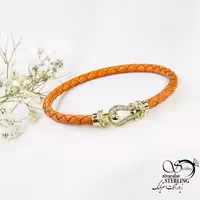 دستبند چرم نارنجی (امگا) با پلاک استیل کد 18871