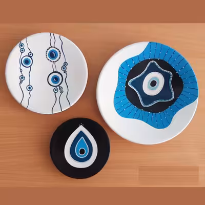 بشقاب دیوارکوب سفالی طرح چشم نظر مجموعه 3 عددی