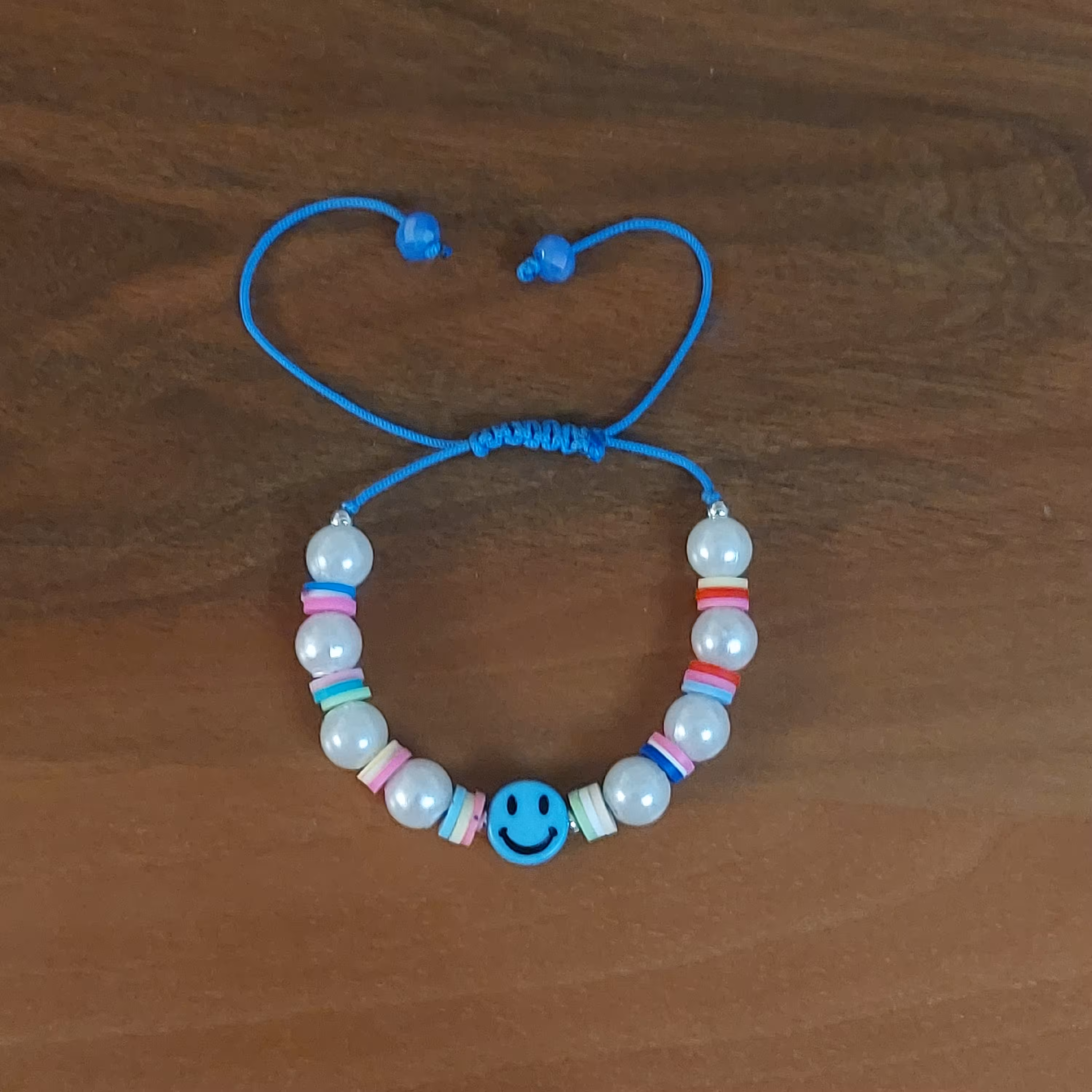 دستبند هپی اسمایل کیوت کد 56 مرواریدی فیمویی آسانسوری