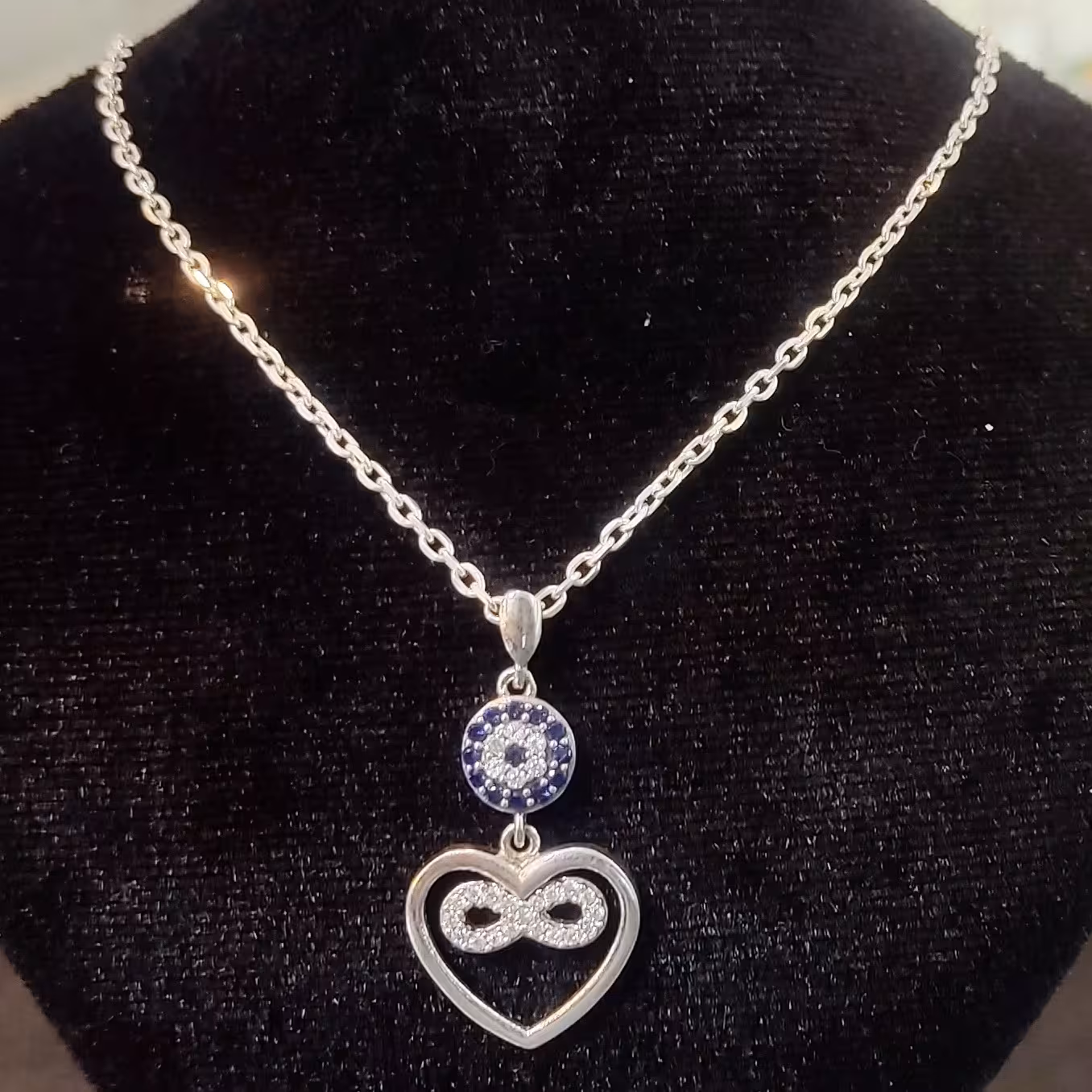 پلاک و زنجیر نقره چشم نظر و بینهایت