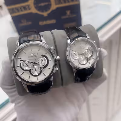 ست ساعت مچی عقربه ای زنانه و مردانه الگانس مدل بند چرمی تک موتوره کد 06