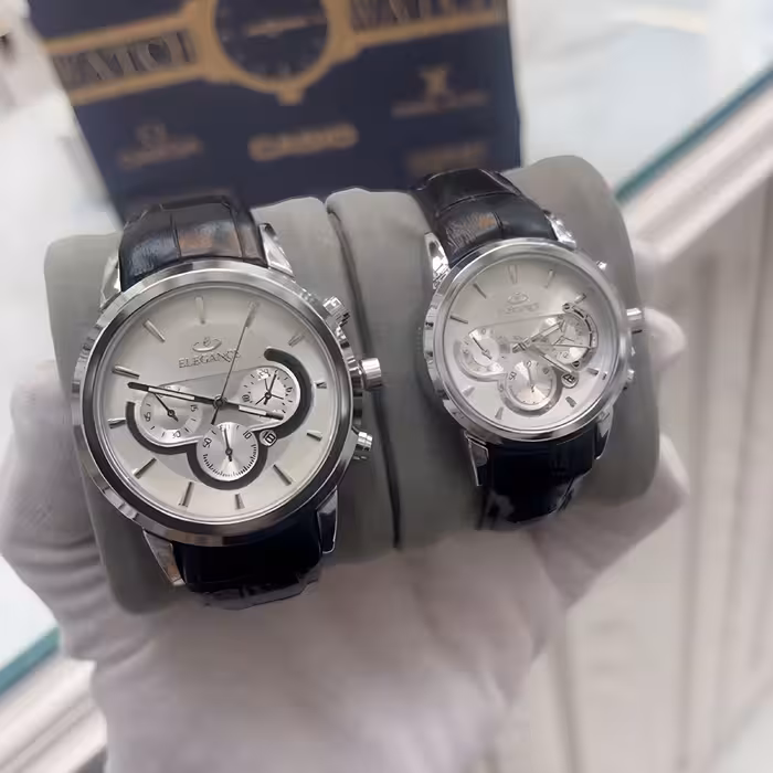 ست ساعت مچی عقربه ای زنانه و مردانه الگانس مدل بند چرمی تک موتوره کد 06