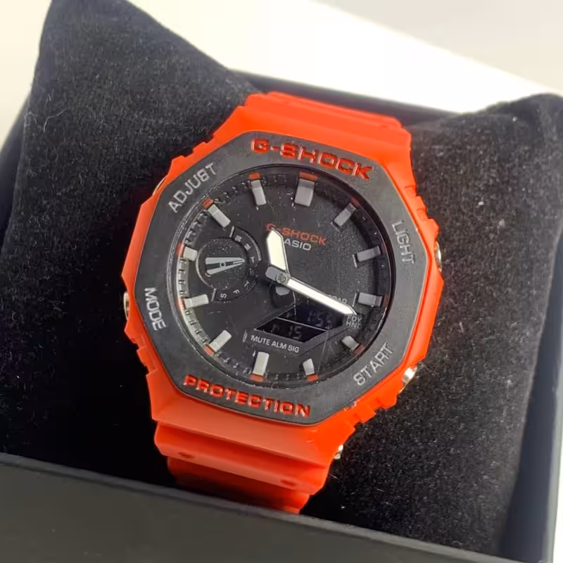 ساعت مچی اسپرت جیشاک دوزمانه 2100 بند قرمز شبرنگ