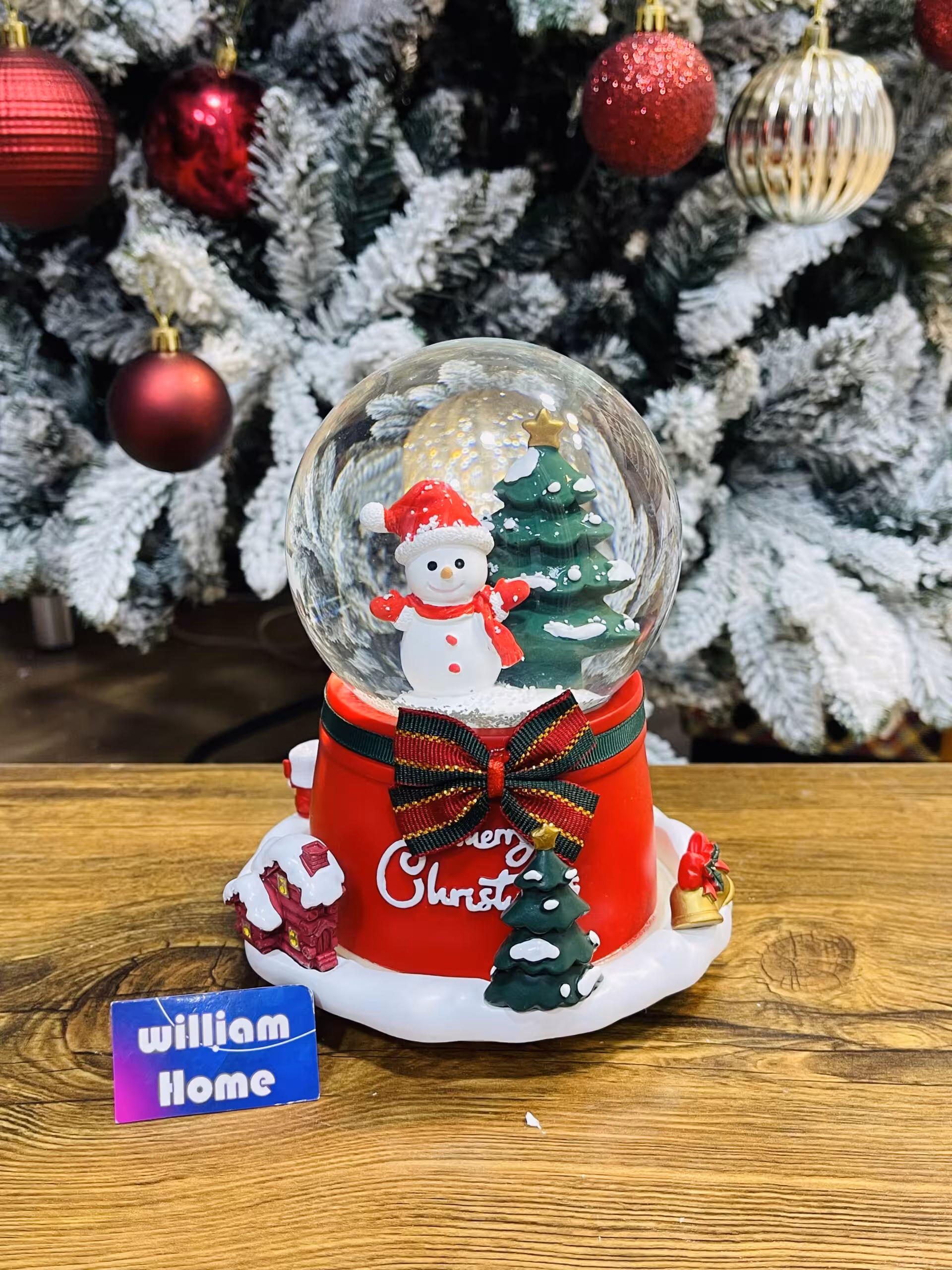 گوی موزیکال کریسمس (فول دور چرخشی)آدم برفی پاپیونی