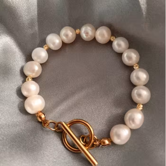 دستبند مروارید پرورشی سایز 8 متریال استیل ضد زنگ mv7