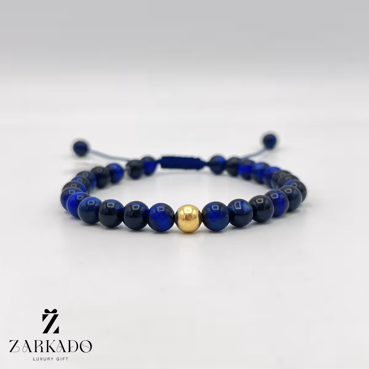 دستبند سنگی لاجورد با گوی طلا کد B6407