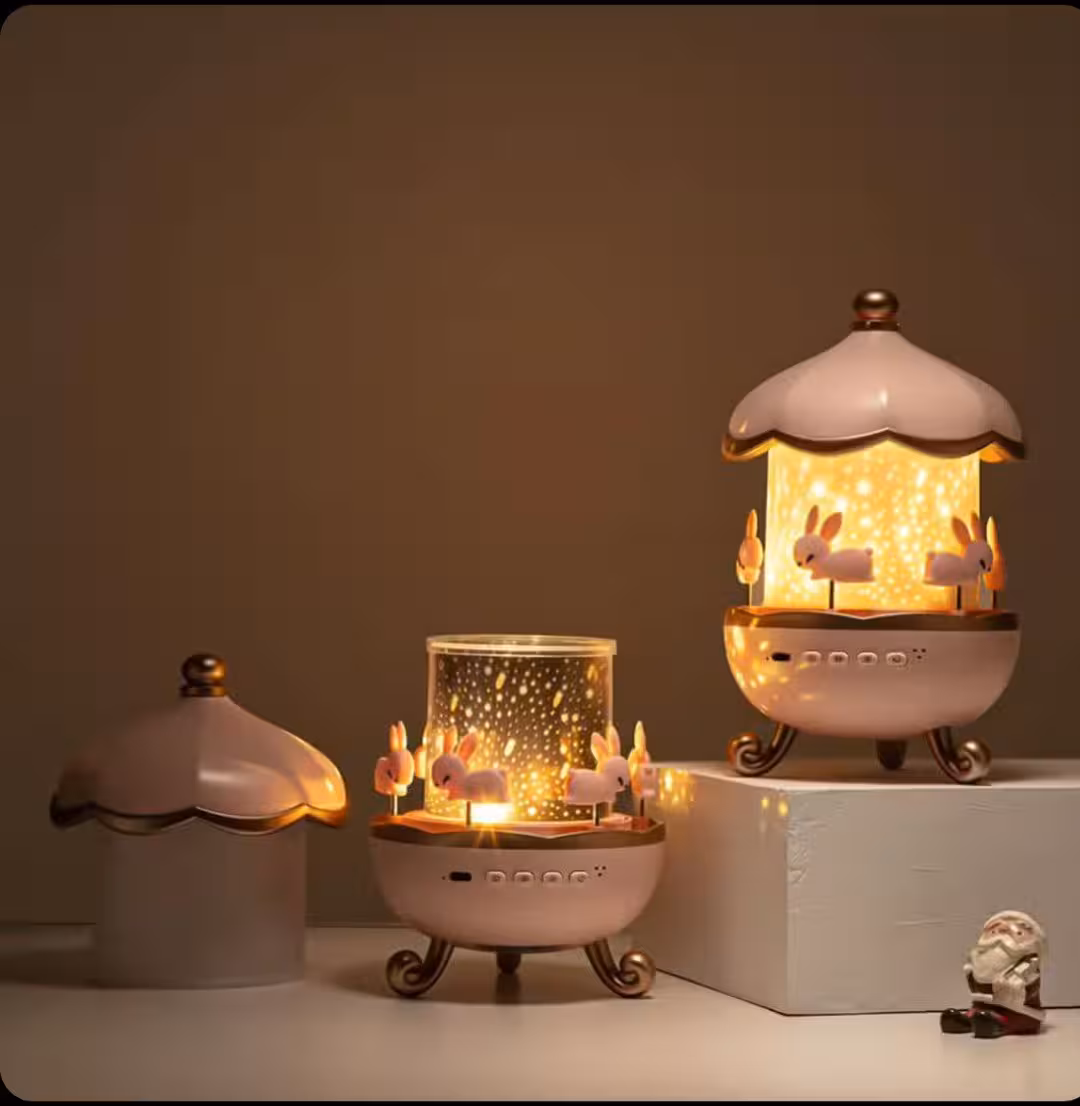 چراغ خواب پروژکتور چرخ و فلک خرگوشی شارژی موزیکال بلوتوث دار