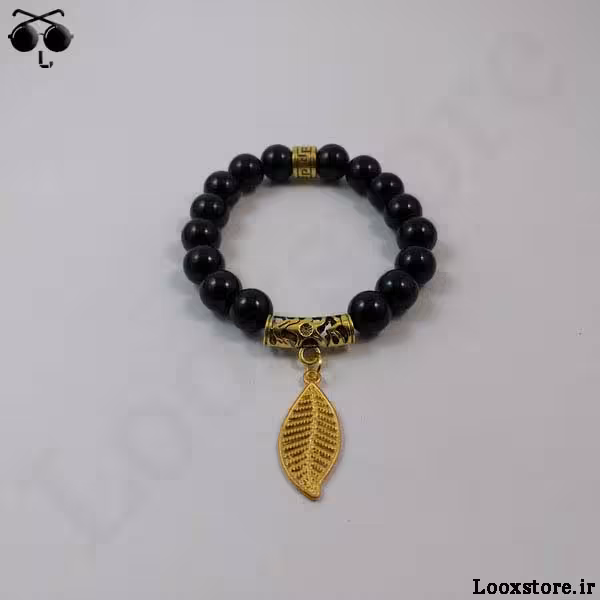 دستبند مهره ای مشکی با آویز برگ طلایی