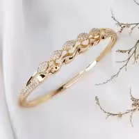 دستبند طرح طلا نگین دار برند ژوپینگ کد 7752