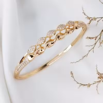 دستبند طرح طلا نگین دار برند ژوپینگ کد 7752