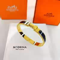 دستبند هرمس مشکی طلایی مستر