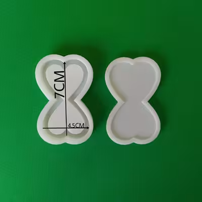 قالب رزین مدل جاکلیدی آکواریومی طرح ساعت شنی قلبی مجموعه 2 عددی