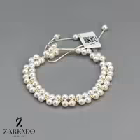 دستبند طلا و مروارید دولاینه با گوی البرنادو