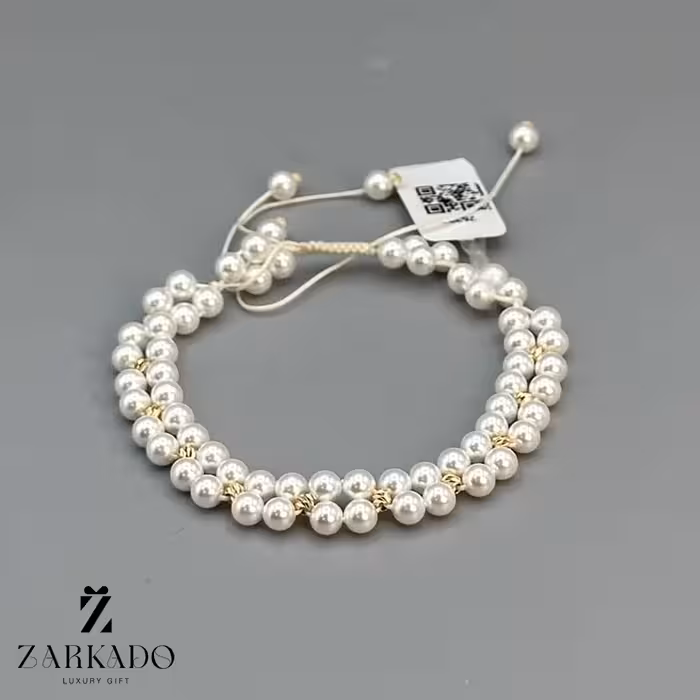 دستبند طلا و مروارید دولاینه با گوی البرنادو