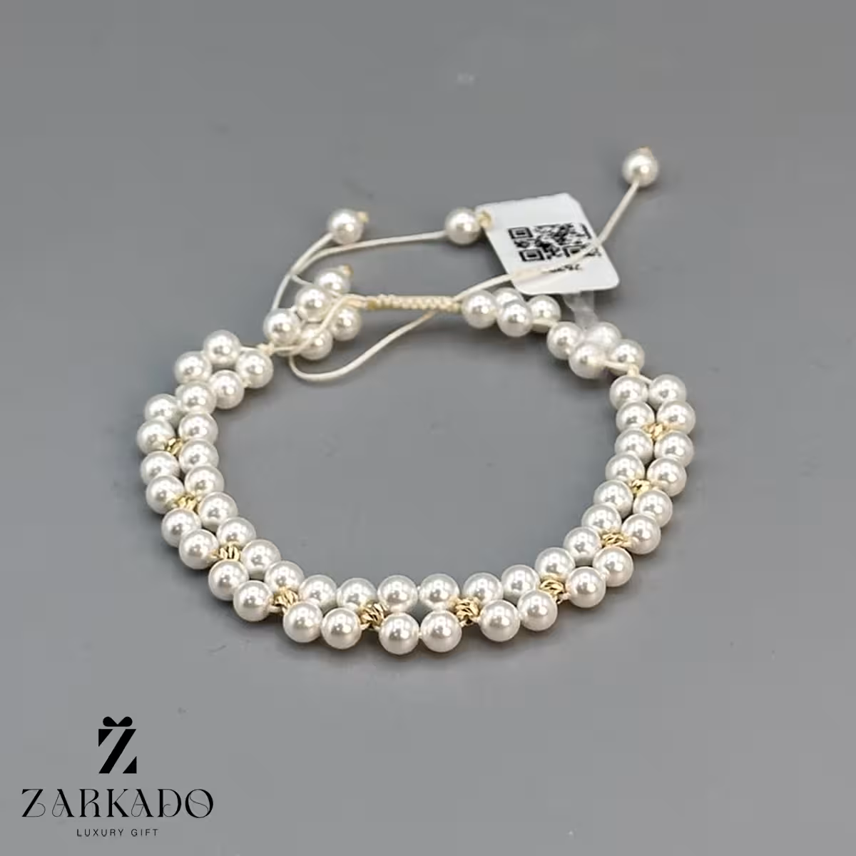 دستبند طلا و مروارید دولاینه با گوی البرنادو