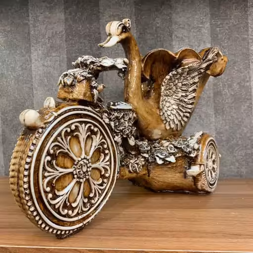 شکلات خوری قو دوچرخه سوار