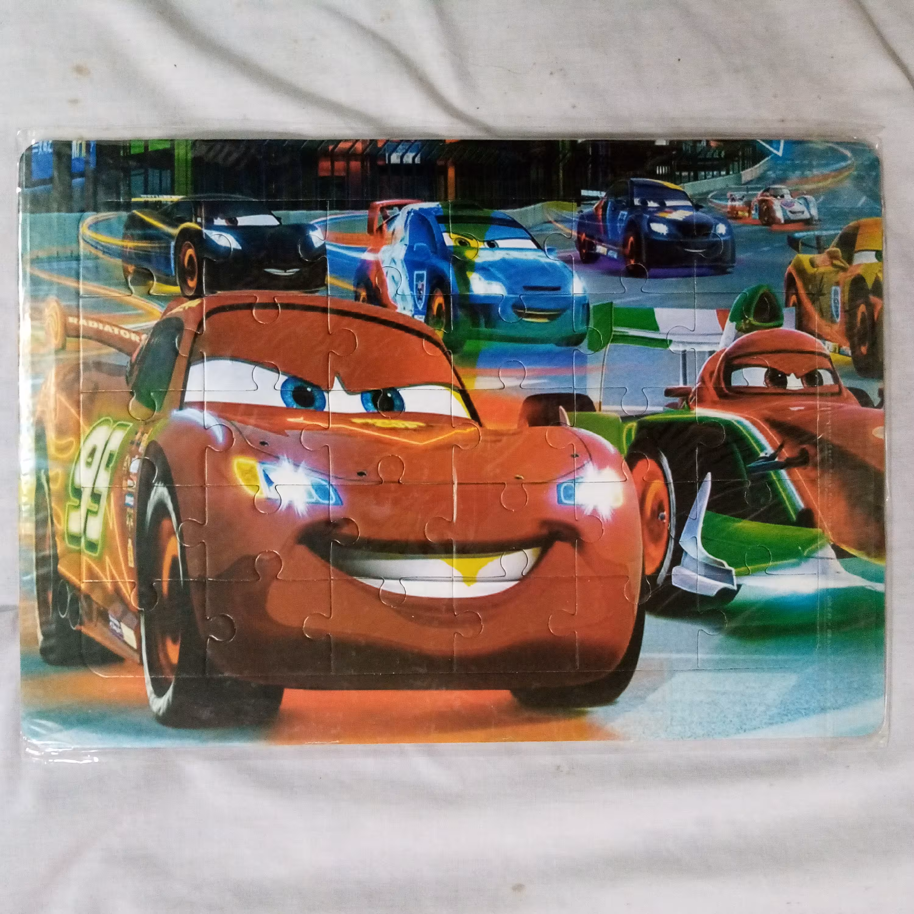 پازل کارتونی ماشین ها سایز33در23پشت وایت برد جورچین