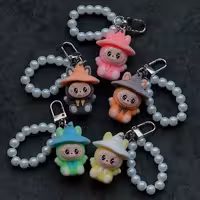 جاکلیدی مخمل لبوبو مرواریدی با آویز پاپیون