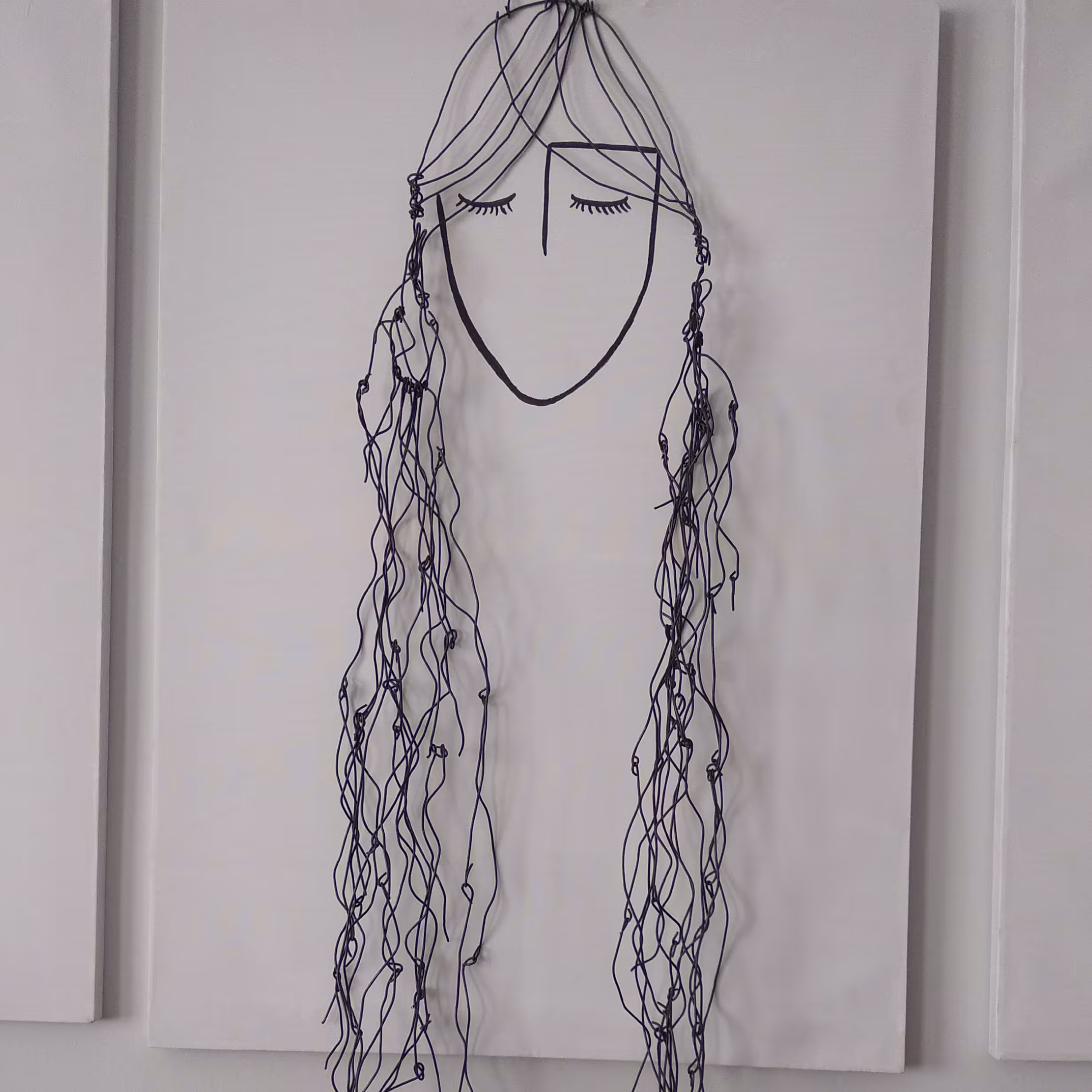 تابلو برجسته طرح دختر گیس بلند