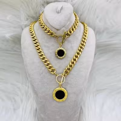 ست گردنبند و دستبند استیل با قفل تی اویز بولگاری