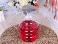 پارچ پیرکس درب استیل مدل Natali برند پاچی AROW