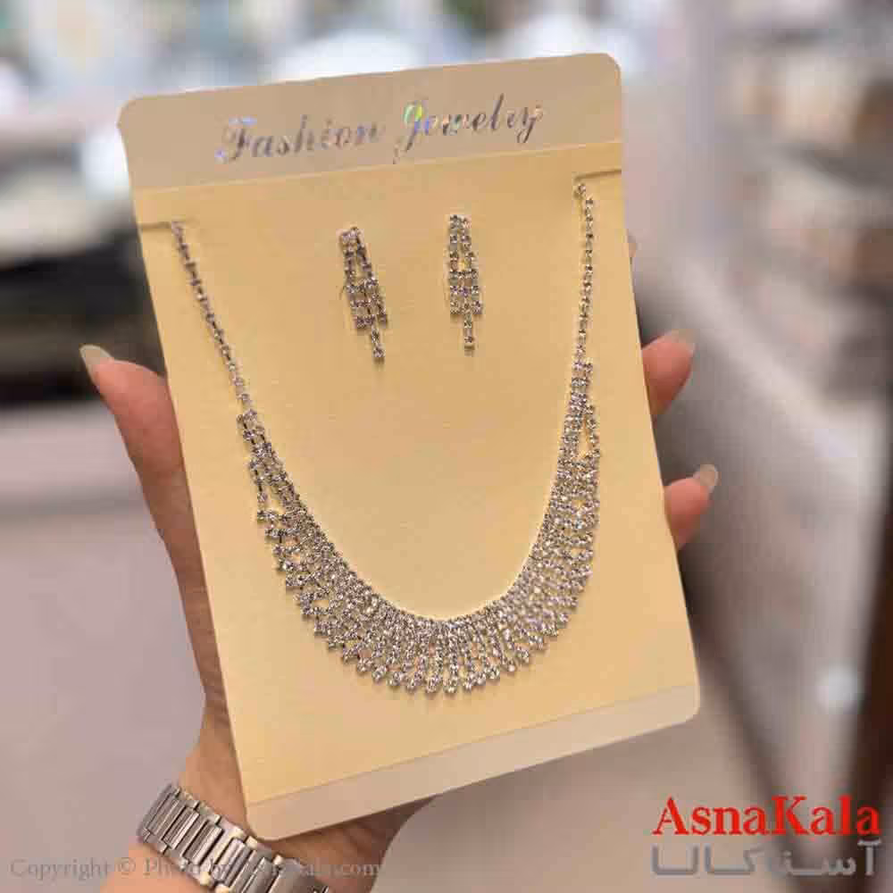 نیم ست زنانه شامل گردنبند و گوشواره استیل مدل نگین نقره ای  کد NIM14757W