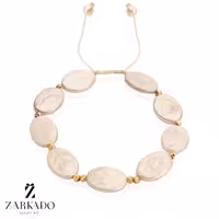 دستبند مروارید باروک بیضی و گوی البرنادو طلا