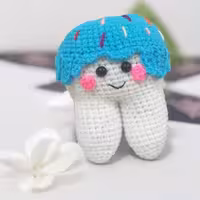 عروسک    دندانی  بافتنی 