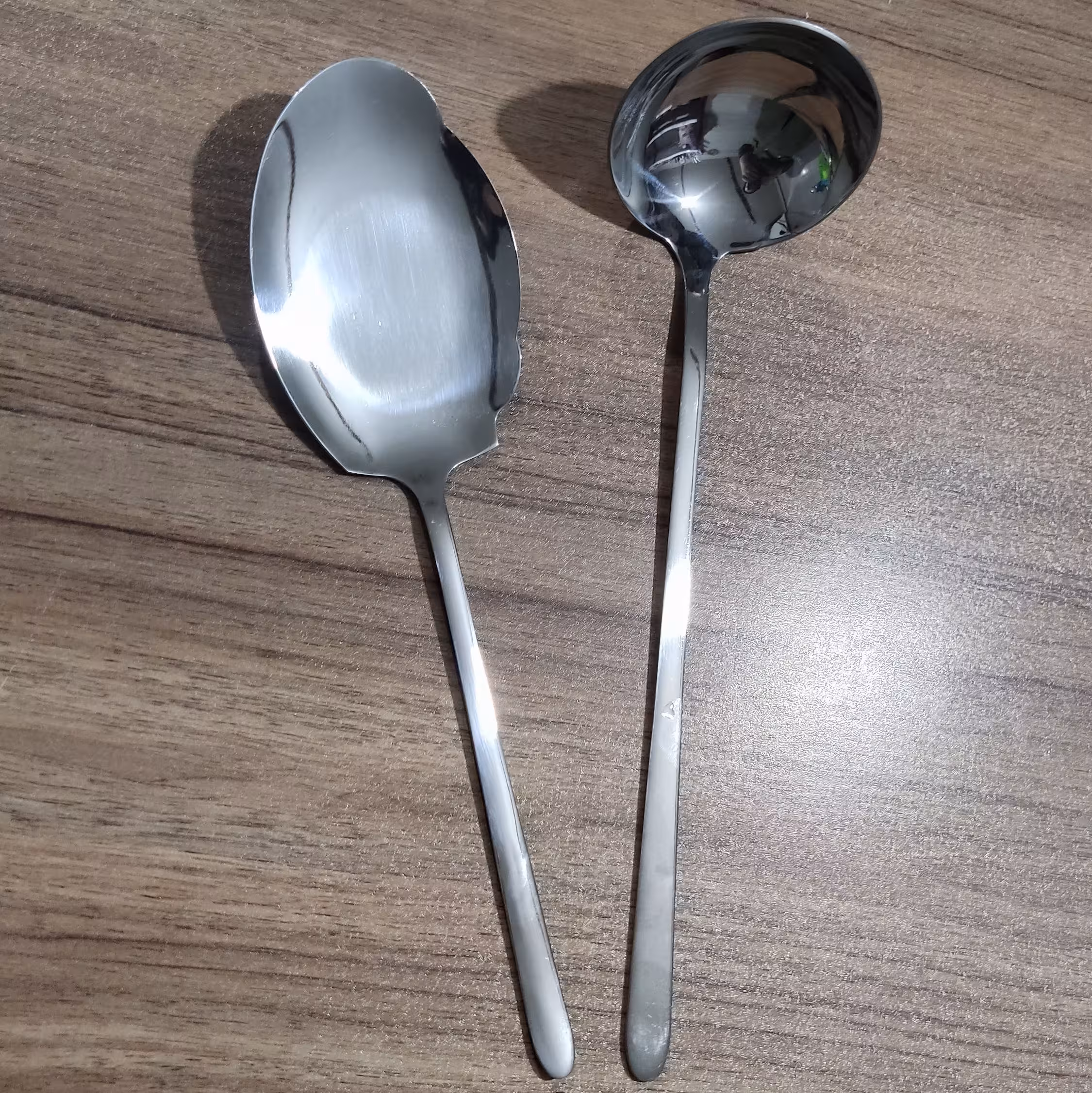 کفگیر و ملاقه استیل یونیک طرح دونا یک عدد کفگیر یک عدد ملاقه