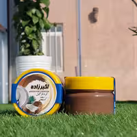 کره نارگیل شکلاتی 200 گرمی اکبرزاده تولید شده از نارگیل پرچرب سریلانکا